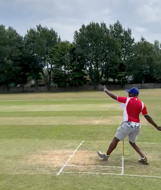 Shams Moussa from Walking With bowls the ceremonial first ball of the game